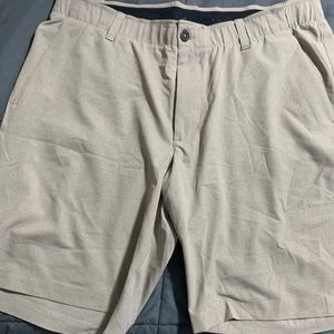 Tan Under Armour golf shorts